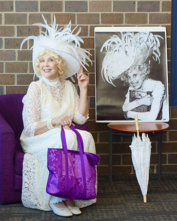 Lynn Rymarz as Carol Channing
